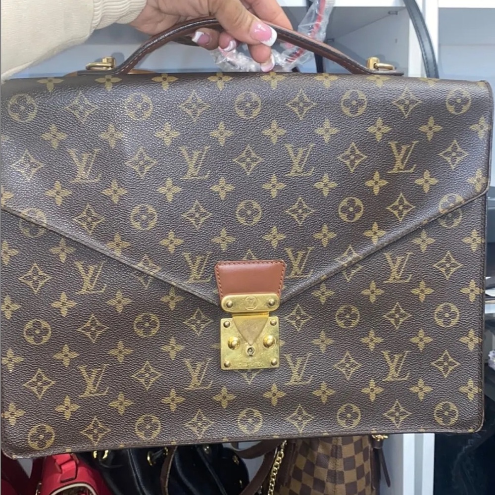 Louis Vuitton Monogram Canvas Briefcase inside has some pealing